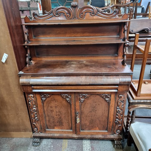 815 - Star lot : An Irish mid 19th century antique elaborate sideboard with lion paw feet, one pull out dr... 