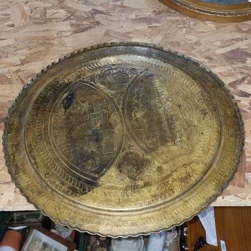 812 - A vintage Indian banaras table with an engraved brass charger top.