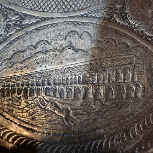 812 - A vintage Indian banaras table with an engraved brass charger top.