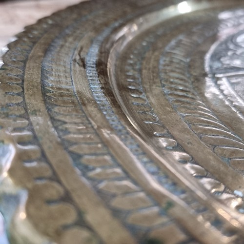 812 - A vintage Indian banaras table with an engraved brass charger top.