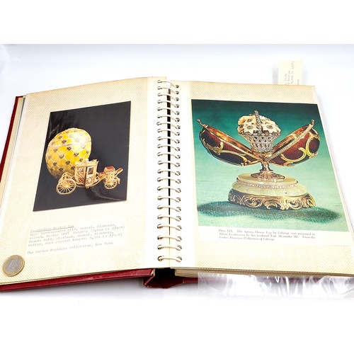 127 - A fully furnished photograph album depicting depicting Faberge jewellery items.