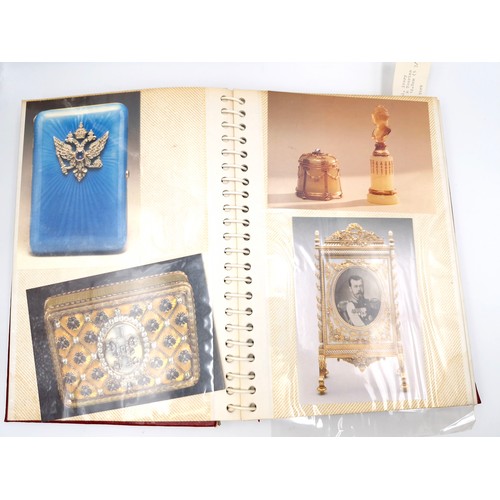 127 - A fully furnished photograph album depicting depicting Faberge jewellery items.