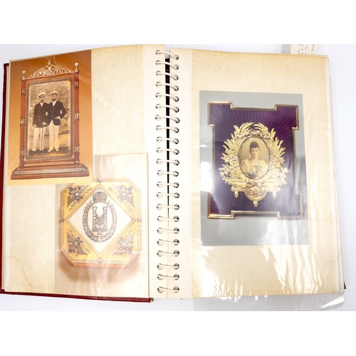 127 - A fully furnished photograph album depicting depicting Faberge jewellery items.