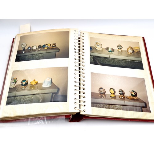 127 - A fully furnished photograph album depicting depicting Faberge jewellery items.