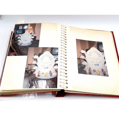 127 - A fully furnished photograph album depicting depicting Faberge jewellery items.