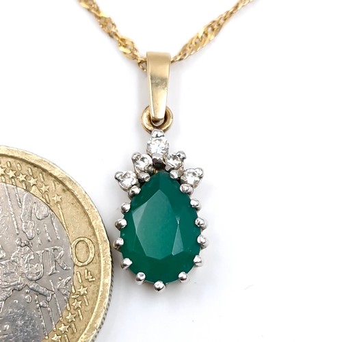 162 - Super Star Lot : A good example of a nine carat gold pear shaped emerald stone pendant with diamonds... 