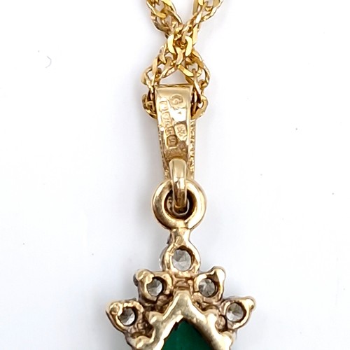 162 - Super Star Lot : A good example of a nine carat gold pear shaped emerald stone pendant with diamonds... 