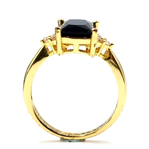 191 - A silver gilt onyx stone ring with gem set accents. Ring size - P. Weight - 2.78 grams. Boxed.