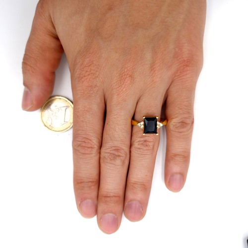 191 - A silver gilt onyx stone ring with gem set accents. Ring size - P. Weight - 2.78 grams. Boxed.