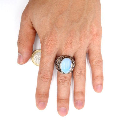 193 - A vintage College style moonstone silver mounted ring. Size - T. Weight - 9.4 grams. Boxed.