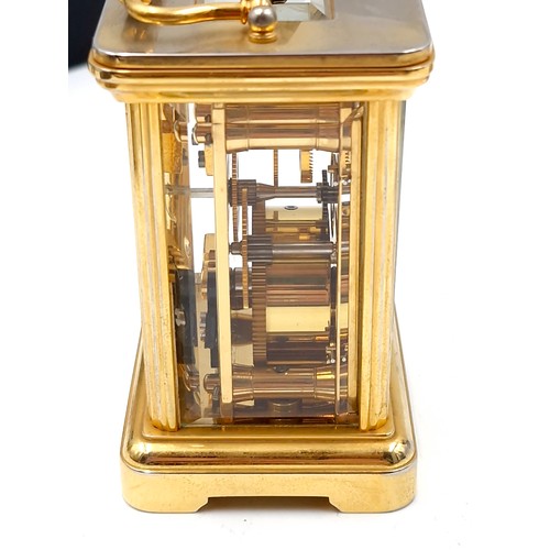 507 - Star lot : A stunning heavy Gluck & Son London 8 day eleven jewels brass carriage clock. Featuring b... 