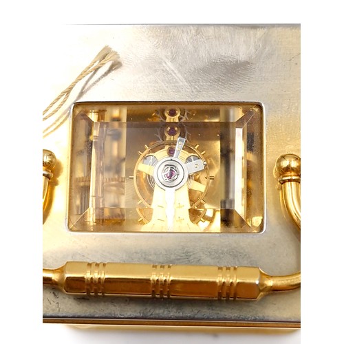 507 - Star lot : A stunning heavy Gluck & Son London 8 day eleven jewels brass carriage clock. Featuring b... 