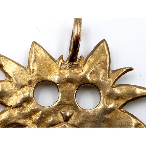 531 - A 1990s Biche De Bere gilded cat pendant. RRP: €63 regalyaz.com. It can be worn with a ribbon or a c... 