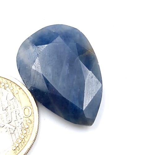 558 - Star Lot : A fabulous large natural blue sapphire in a pair mixed cut 25.77 carats from the Internat... 