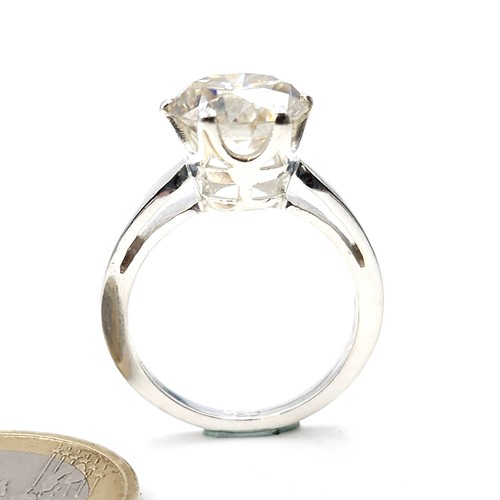 574 - A 2.5ct white moissanite gemstone ring set in sterling silver stamped 925 to inner band. Ring size T... 