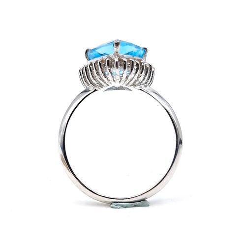 579 - A stunning blue topaz gemstone ring approx. 3ct with diamond surround set in sterling silver stamped... 