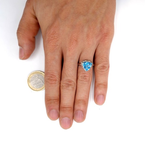 579 - A stunning blue topaz gemstone ring approx. 3ct with diamond surround set in sterling silver stamped... 