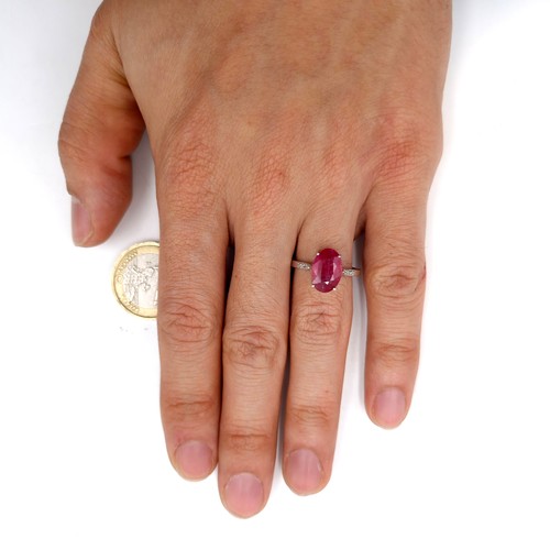 580 - A fabulous 3ct oval cut ruby gemstone ring with .10ct diamond shoulders set in sterling silver stamp... 