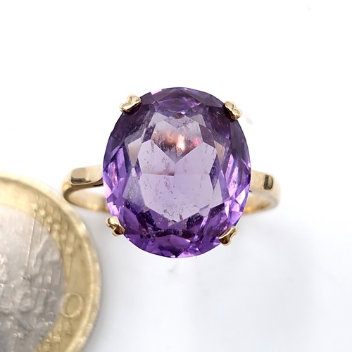 1059 - Star Lot : A quality nine carat gold amethyst stone ring with claw mount. Ring size - Q. Weight - 3.... 