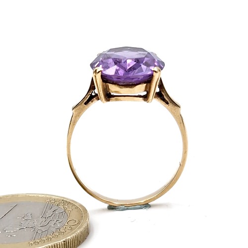 1059 - Star Lot : A quality nine carat gold amethyst stone ring with claw mount. Ring size - Q. Weight - 3.... 