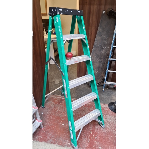 313 - A good five step fibre glass ladder.