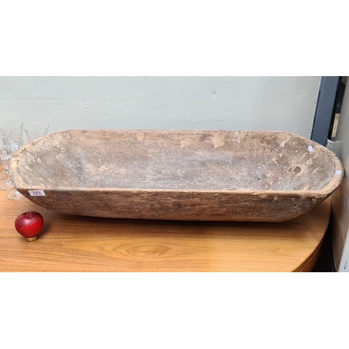 323 - A large antique Hand-carved rustic wooden dough trough, exhibiting natural patina.