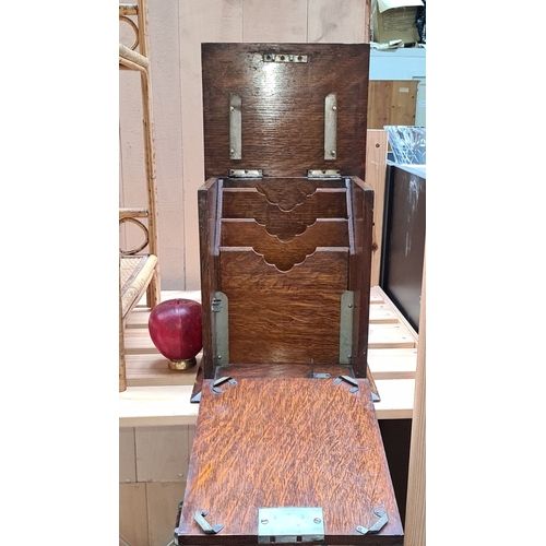 337 - A lovely antique oak stationery box with brass fittings and compartmented interior, from the Edwardi... 