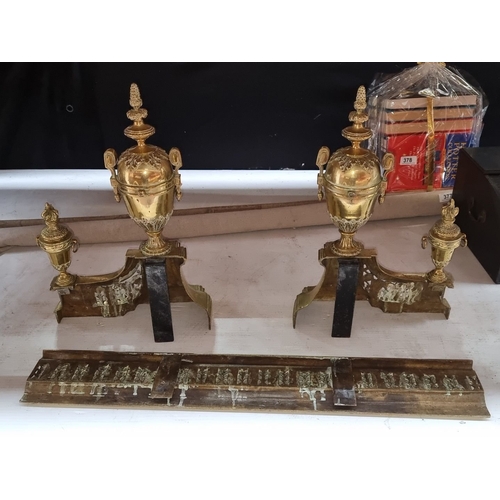 375 - Star Lot : A fabulous Gilt brass neoclassical fireplace fender with urn finials and intricate relief... 