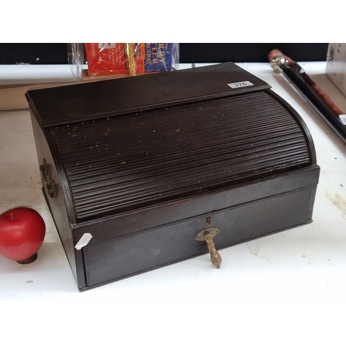 376 - Victorian mahogany roll-top stationery box, featuring brass keyhole and multiple interior compartmen... 