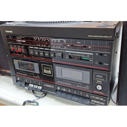 410 - Toshiba Stereo Sound System Model SL-7, featuring dual cassette decks and turntable, complete with s... 