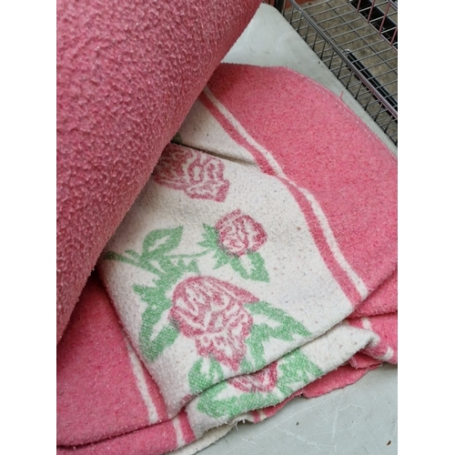 412 - Collection of vintage Irish wool blankets featuring vibrant patterns and floral designs.