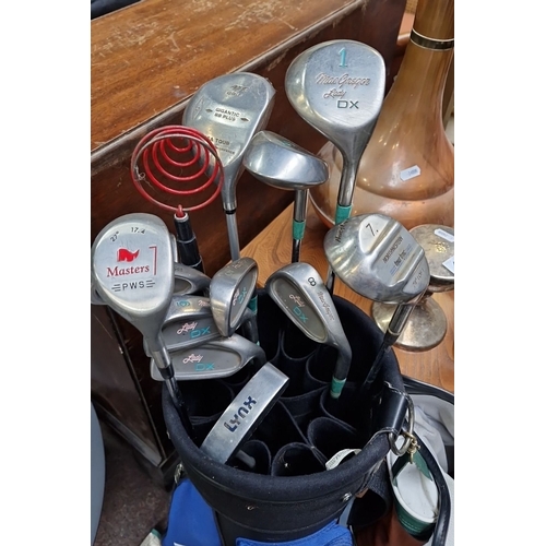 428 - Golf club set includes Top-Flite and MacGregor bags, various sizes and brands including Masters, Lyn... 