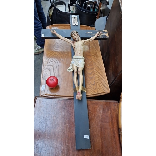 433 - A Large Crucifix featuring a detailed wood-carved Christ figure, from mid-century, with an INRI plaq... 