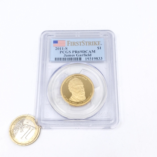 527 - An encapsulated graded PR69 coin (first strike) one dollar dated 2011. James Garfield Presidential s... 