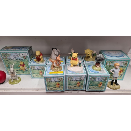 131 - Star Lot : A selection of nine Royal Doulton figurines from the Winnie-the-Pooh collection, includes... 