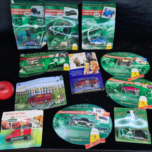 149 - A selection of ten beer advertising model toy trucks, all unopened in original packaging.