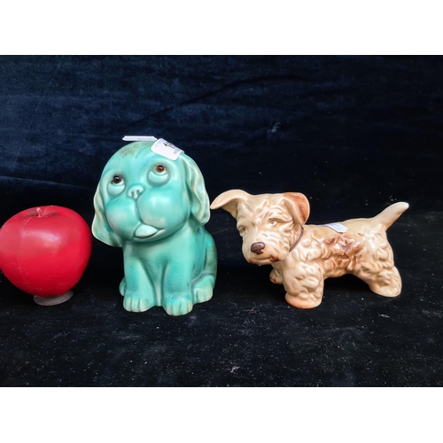 163 - Two vintage ceramic dogs including a charming 1930's Crown Devon Bonzo example with glass eyes and a... 