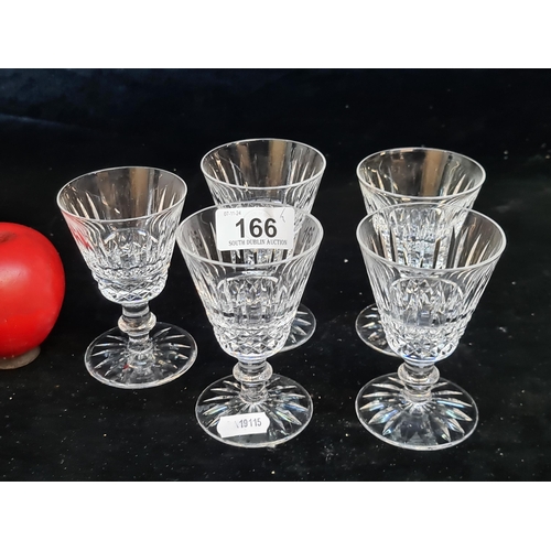 166 - Five Waterford Crystal stemmed glasses in the Tramore pattern. All in good condition with acid marks... 