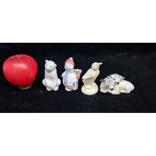 172 - Four porcelain animal figurines including two Nao by Lladro examples. Including Christmas examples a... 