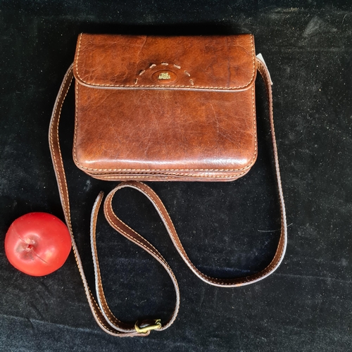 176 - A beautiful 'The Bridge' vintage leather handbag in cognac leather with brass hardware. In good cond... 