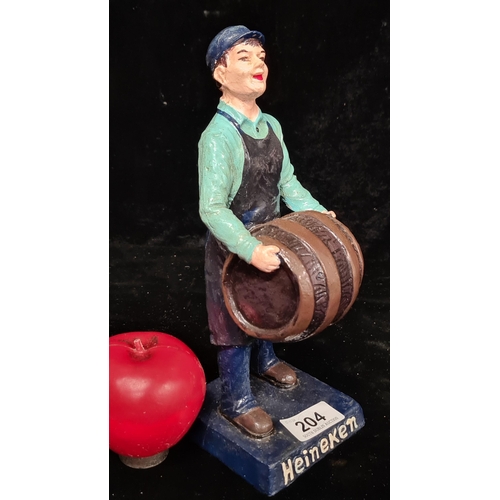 204 - A hand painted Heineken figurine in the form of cooper and barrel.