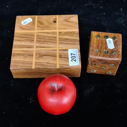 207 - Two wooden games boxes including a noughts and crosses board and pieces and a brass inlayed dice box... 