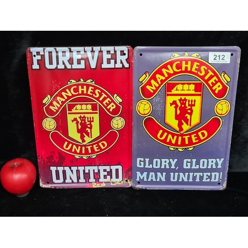 212 - Two printed metal wall signs reading 'Manchester United'.