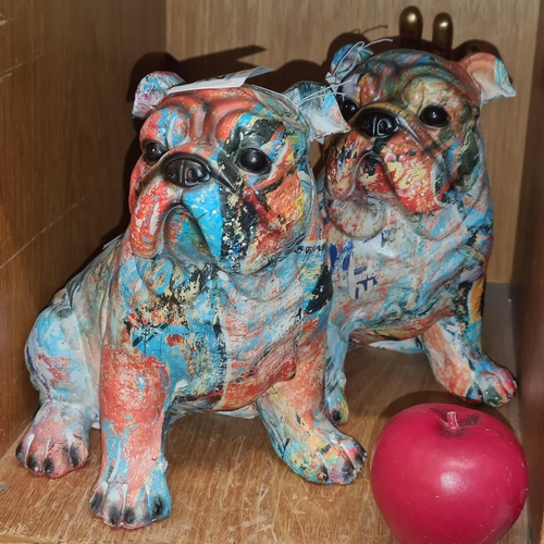 221 - A pair of large funky Bulldog figures in papier mache finish. Brand new from a top UK Interior desig... 