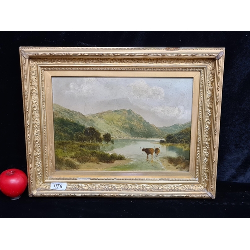 78 - An original oil on canvas painting featuring a serene mountainous landscape and a river with two Lon... 