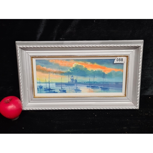 88 - A delightful acrylic on canvas painting featuring the pier in Howth as the sun is setting. This work... 