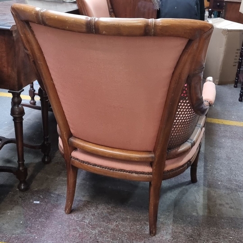 441 - Star Lot : A lovely Pair of vintage cane side armchairs with bamboo-style frames and salmon pink uph... 