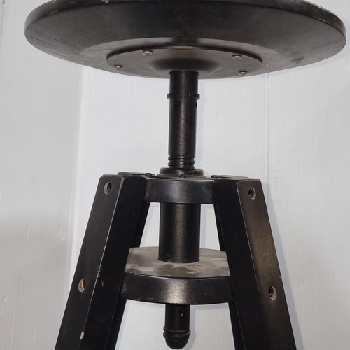 453 - Pair of industrial-style adjustable black metal stools with circular seats and tripod legs. Could al... 