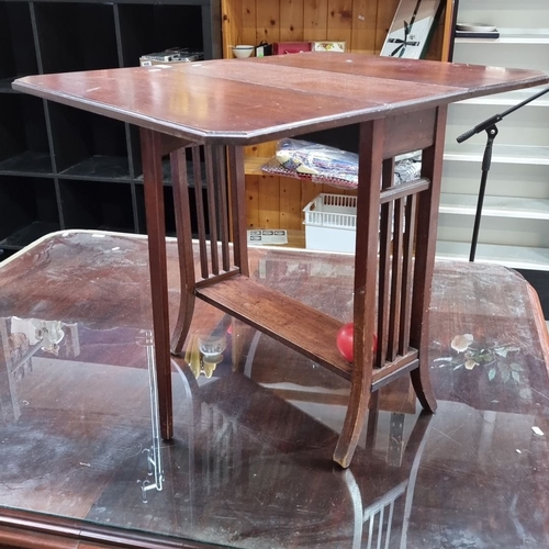 456 - A very handsome Mahogany drop-leaf side table, early 20th century. Features slatted supports, lower ... 