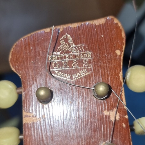 497 - Banjo with resonator, six-string, in hard case with blue interior lining from the mid-20th century. ... 